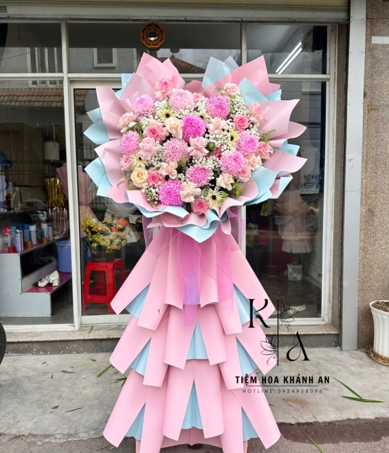 Kệ hoa chúc mừng hồng xanh dễ thương