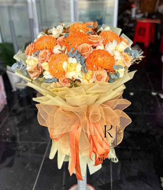 Mẫu bó hoa tươi chúc mừng tone cam-hoa tặng tốt nghiệp