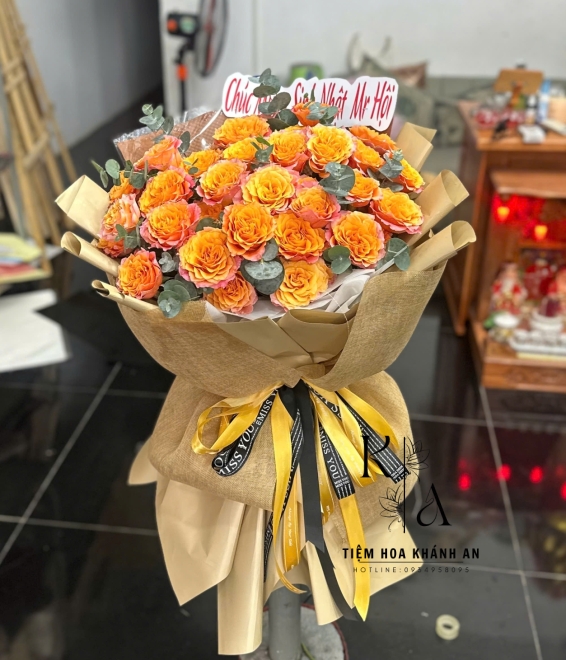 Mẫu bó hoa tươi chúc mừng khai trương tone cam giao hoa biên hòa