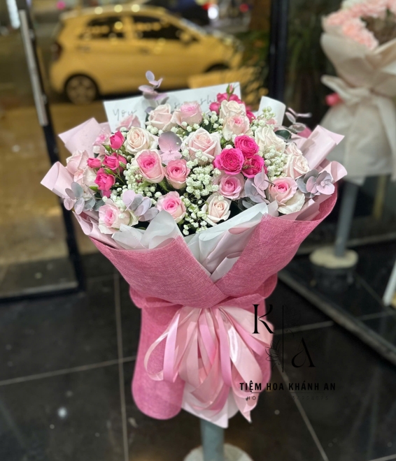 Bó hoa chúc mừng tone hồng ở biên hòa
