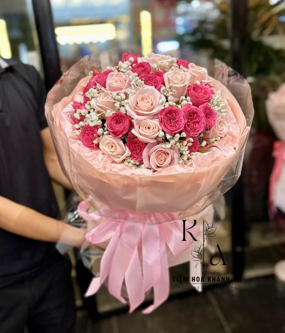 Bó hoa chúc mừng tone hồng bó tròn hot 