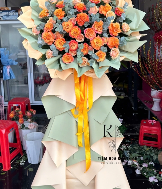 Kệ hoa khai trương tone cam mẫu đẹp
