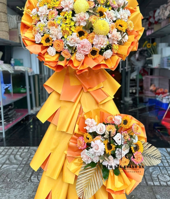 Kệ hoa khai trương màu cam 2 tầng