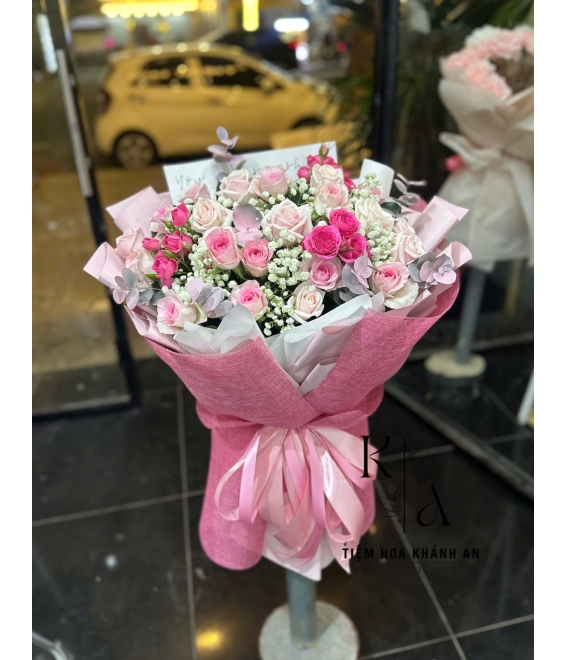 Bó hoa chúc mừng tone hồng ở biên hòa