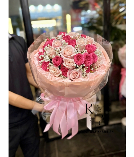Bó hoa chúc mừng tone hồng bó tròn hot 